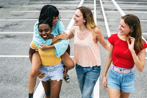 Premium Photo | Group of diverse women walking together