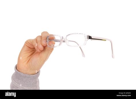 Hand holding glasses Stock Photo - Alamy