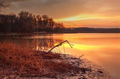 Autumn sunset on the lake stock photo. Image of gold - 36219224