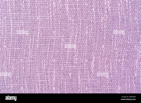 Light purple background from a textile material. Fabric with natural texture Stock Photo - Alamy