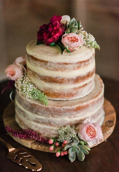 Two tier semi naked wedding cake covered in white chocolate ganache cake by Lilly Roses Cakes ...