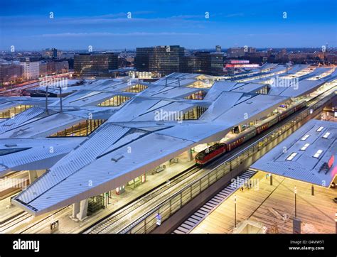 Railway Station Wien Hauptbahnhof (Vienna Central Station) ÖBB at night and snow , with train ...