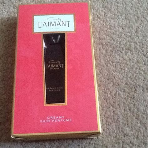 PERFUME Coty L'AIMANT creamy skin perfume. in Staffordshire Moorlands ...