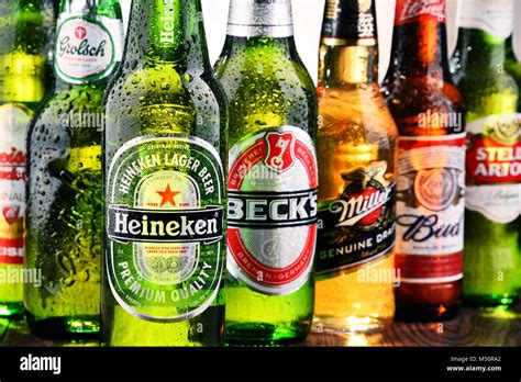 Bottles of assorted global beer brands Stock Photo - Alamy