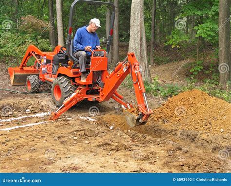 Man Digging Trench With Backhoe Stock Photography - Image: 6593992