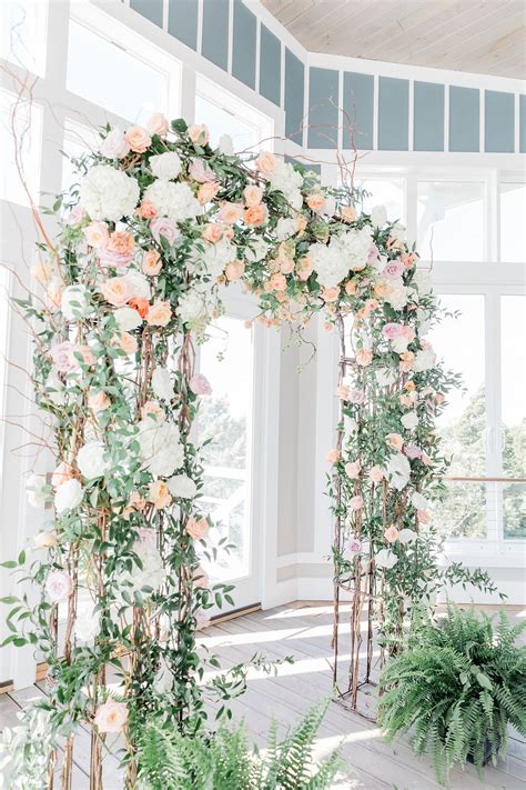 This Wedding Arch With Flowers Created a Picture-Perfect Backdrop