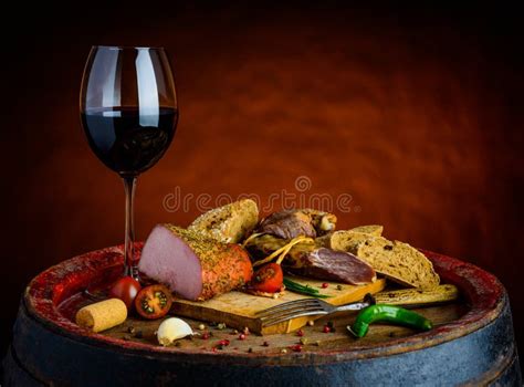 Red wine and smoked meat stock photo. Image of drink - 64858494