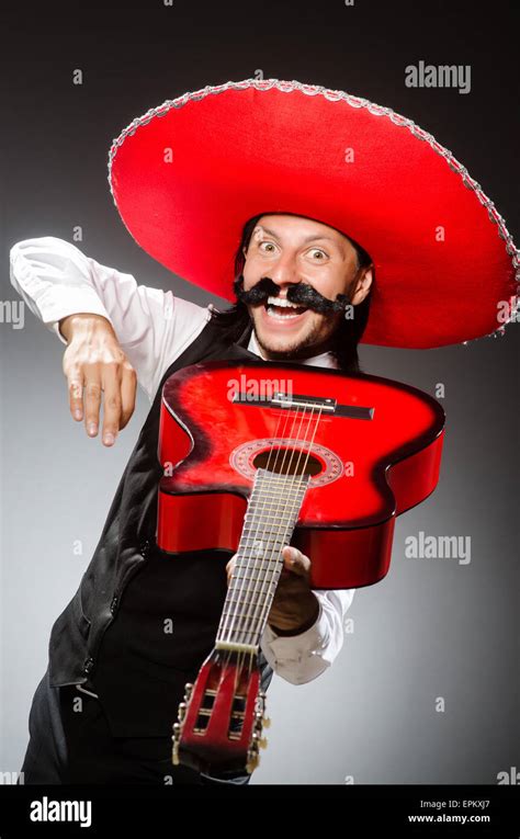 Mexican man wears sombrero isolated on white Stock Photo - Alamy