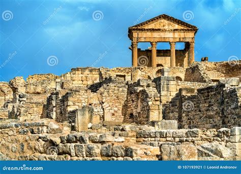 The Roman Capitol at Dougga. UNESCO Heritage Site in Tunisia Stock Image - Image of colonnade ...