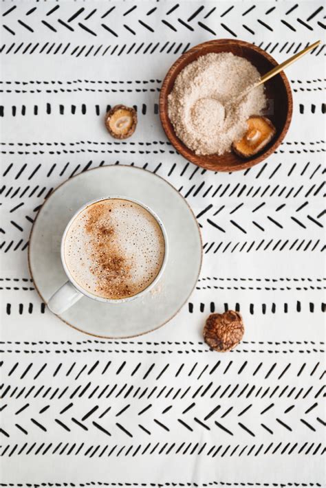 Top view of mushroom latte with Shiitake powder and unsweetened coconut-almond blend milk ...