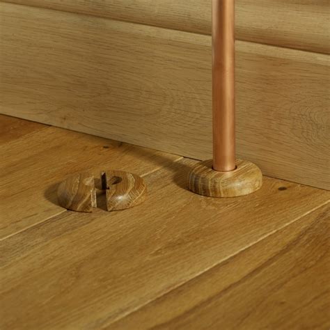 Woodland Oak radiator pipe covers for use with wood flooring ...