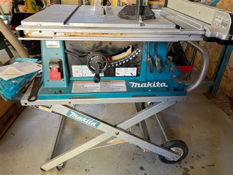 MAKITA PORTABLE TABLE SAW MODEL 2704 WITH FOLDING STAND - Able Auctions