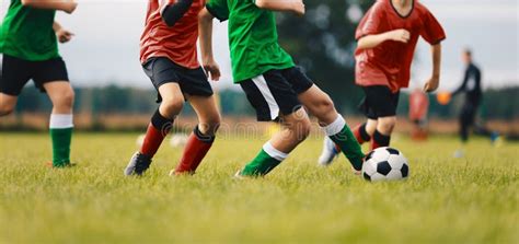 Children Play Football Games. Kids in Two Teams Kicking Soccer Classic Ball Stock Image - Image ...