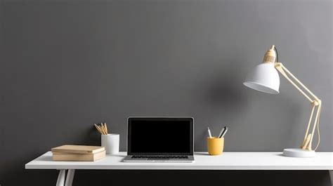 Premium AI Image | A desk with a lamp and a laptop on it