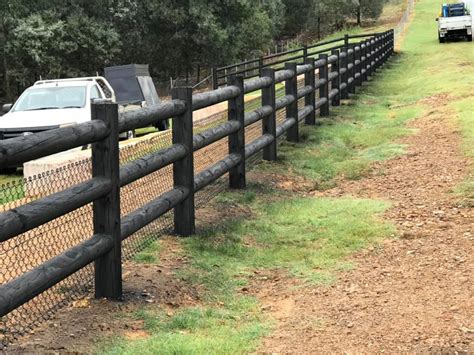 Painted Round Rail Fence Cattai NSW | StockWorx