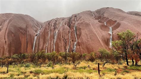 Uluru: 'Unique' waterfalls appear on landmark after rain in Australia - YouTube