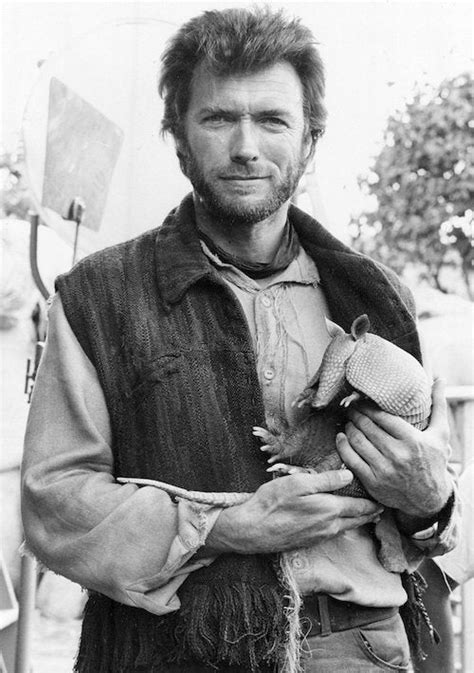 Young Clint Eastwood holding a young armadillo : r/WTF