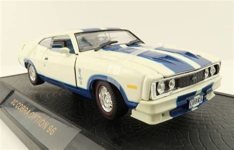 DDA Collectibles Option 96 XC Cobra Ford Falcon with White Blue Stripes ...