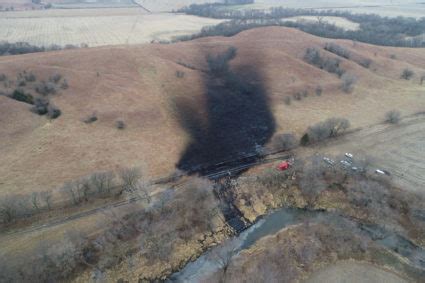 Keystone pipeline shuts down after oil spill in Kansas creek | PBS News