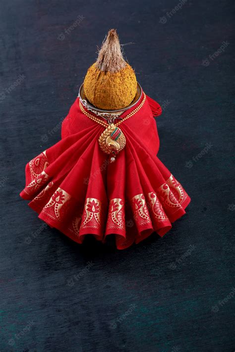 Premium Photo | Decorative kalash with coconut and leaf with floral ...