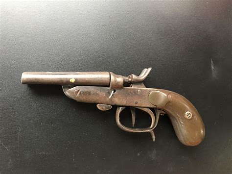 Can you guys help me identify this old double barrel pistol I inherited from my grandfather and ...