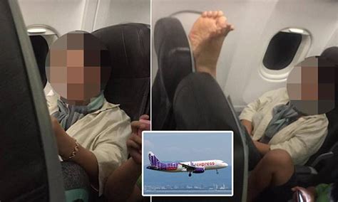 HK Express passenger puts bare feet on back of her seat | Daily Mail Online