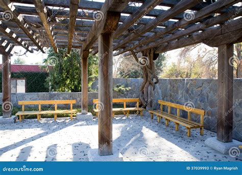 Wooden Overhang With Benches Stock Image - Image: 37039993