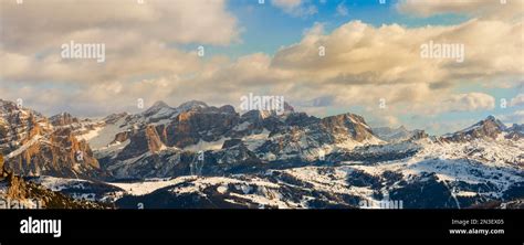 Snowy Dolomites during winter in Italy, with a view towards Tofana and ...