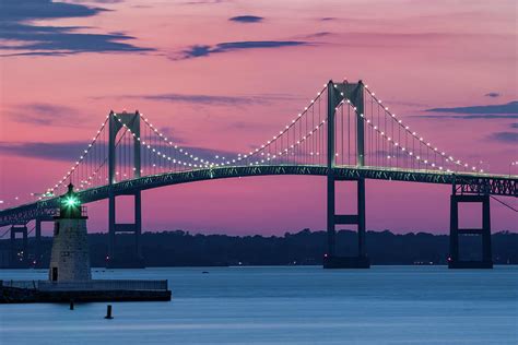 Goat Island Lighthouse and Claiborne Pell Bridge, Newport, Rhode Photograph by Dawna Moore ...