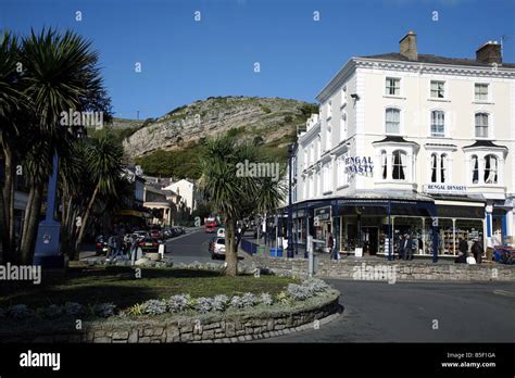 Shops, cafes and restaurants in Llandudno town centre Stock Photo - Alamy