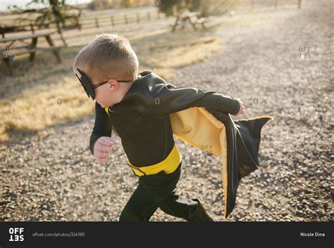 Boy dressed up as a super hero stock photo - OFFSET