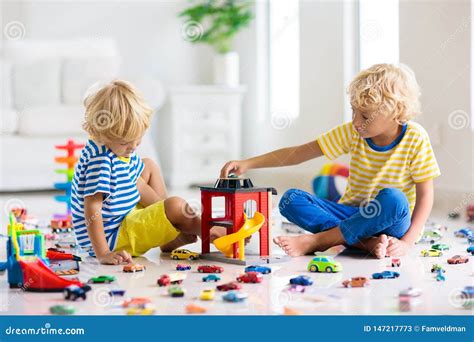 Kids Play with Toy Cars. Children Playing Car Toys Stock Image - Image of living, family: 147217773