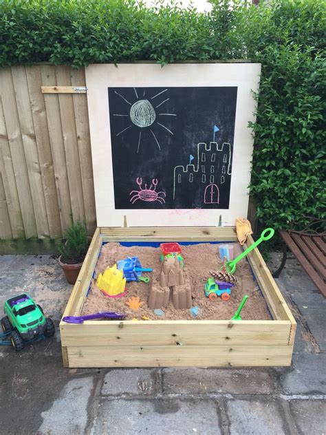 Homemade sandpit using decking board and a blackboard lid … | Pinteres…