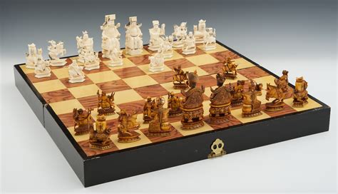 A Chinese Carved Ivory Chess Set with Custom Made Case/Game Board, 05.28.11, Sold: $1035