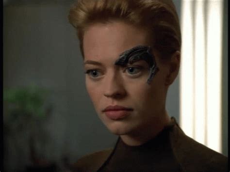 a woman with face paint on her face in a scene from the movie star trek