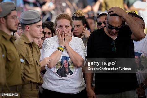 The parents of Israeli soldier Corporal Noa Marciano react as they ...