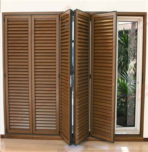 China High Quality Woodgrain Aluminum Bi-Folding Shutter Door (BHA-DBF04) - China Bi-Folding ...