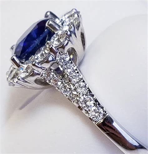 18 Karat White Gold Cushion Cut Sapphire and Diamond Ring For Sale at 1stdibs