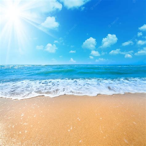 Download Enjoy a Blissful Summer Beach Day | Wallpapers.com