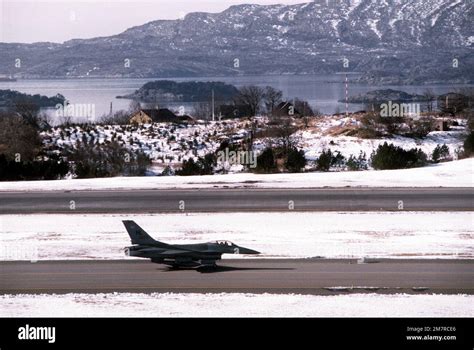 A right side view of an F-16 Fighting Falcon aircraft from the 4th Tactical Fighter Squadron as ...