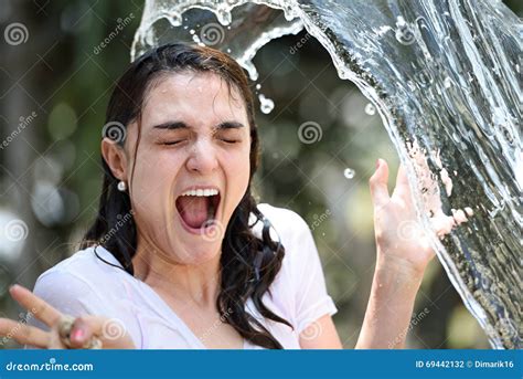 Water splash on girl face stock photo. Image of portrait - 69442132