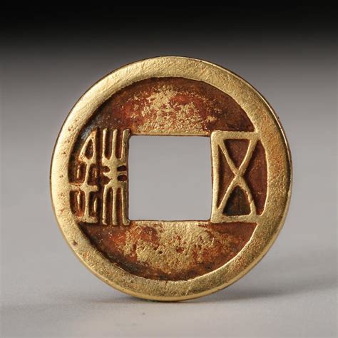 Sold at Auction: CHINESE GILT BRONZE COIN