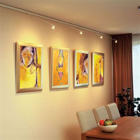 Track lighting systems | Gallery lighting, Picture hanging, Art hanging system