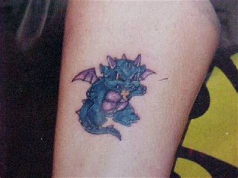 Blue angry little dragon tattoo - Tattooimages.biz