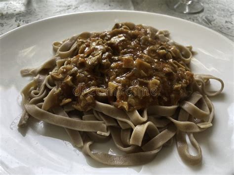 Chestnut Flour Pasta with Mushroom Sauce Stock Image - Image of table ...