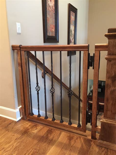 Custom dog gate built to match our existing stair railing. Made from ...