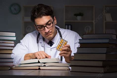 Medical Student Preparing For University Exams At Night Photo Background And Picture For Free ...