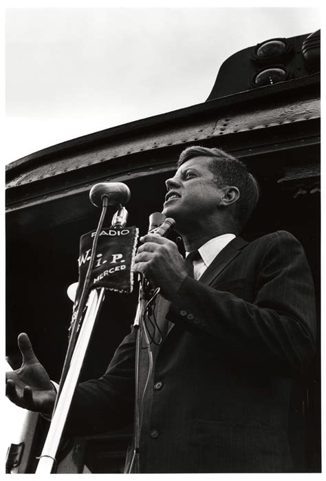 [John F. Kennedy giving a speech on the back of his campaign train, Merced, California ...