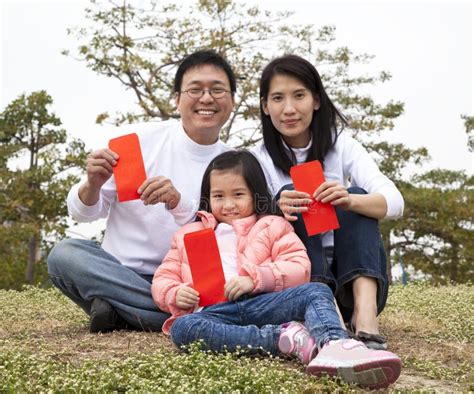 Happy Chinese Family Holding Red Envelop Royalty Free Stock Image ...