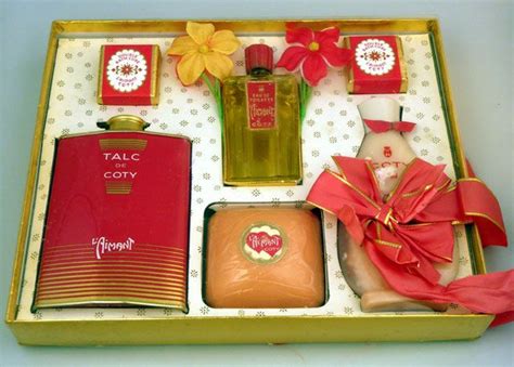 A Boxed Coty L'Aimant Powder, Cream and Soap Set | Vintage perfume, Perfume bottles, Coty